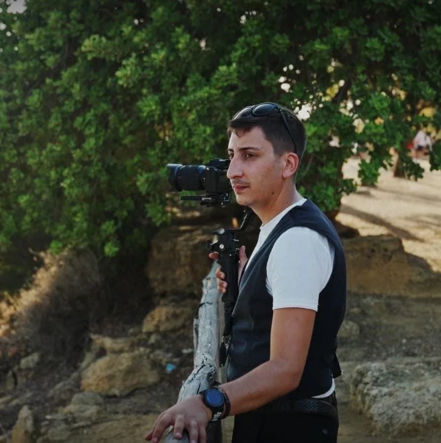 Salvo La Rocca photographing on location in the Sicilian countryside