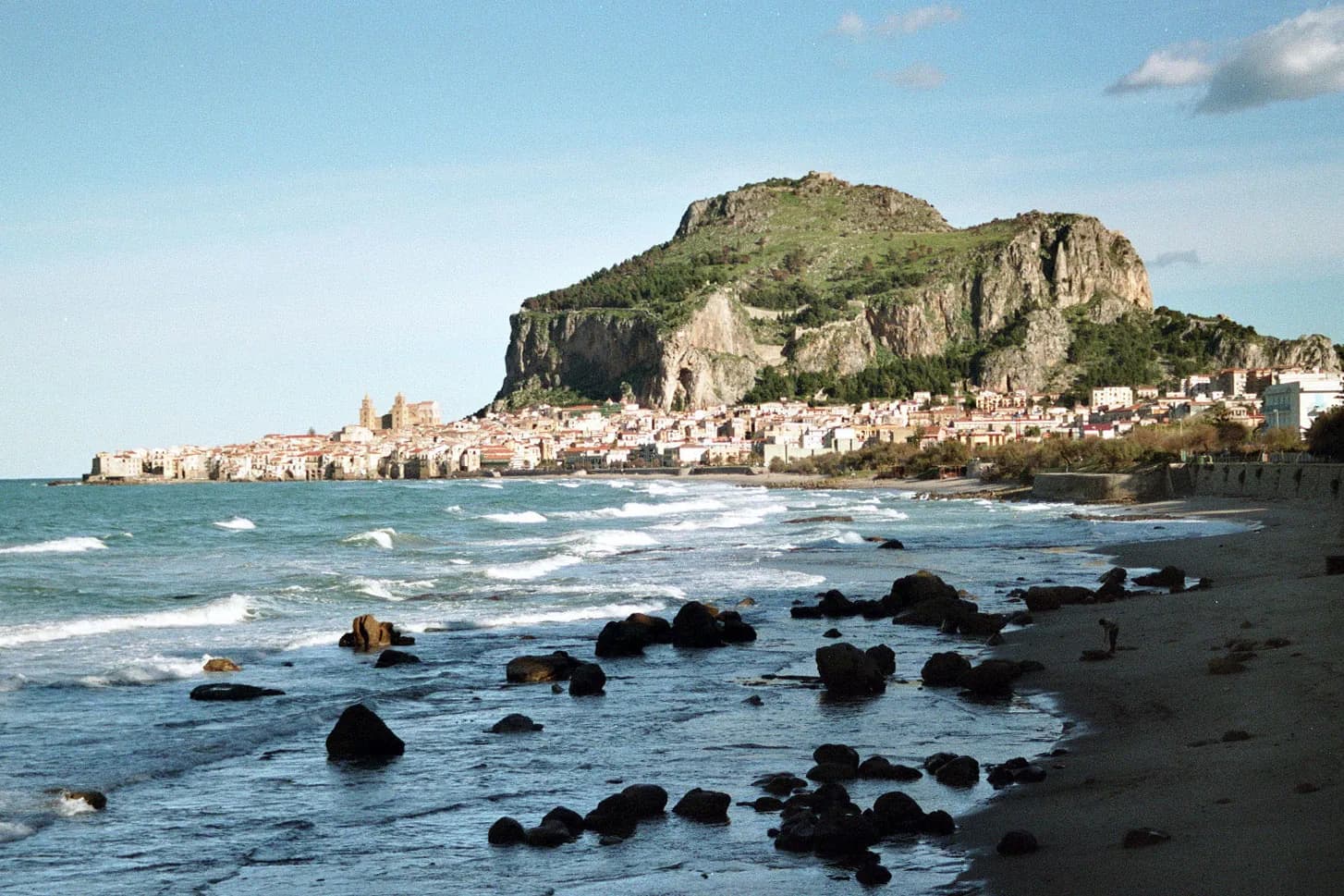 La Rocca standing over the medieval town of Cefalù and the sea