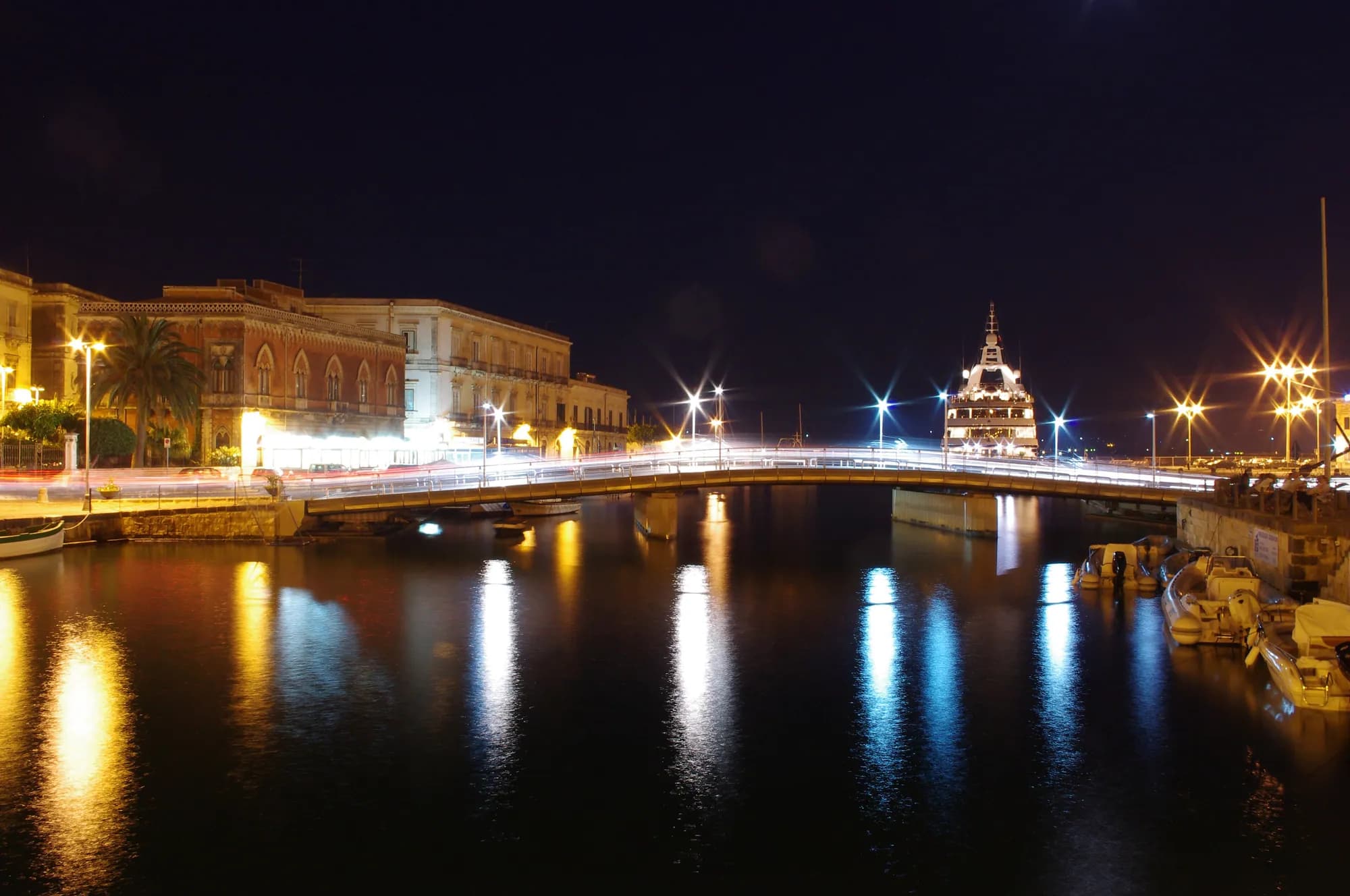 The old harbour of Ortigia in Siracusa at dusk